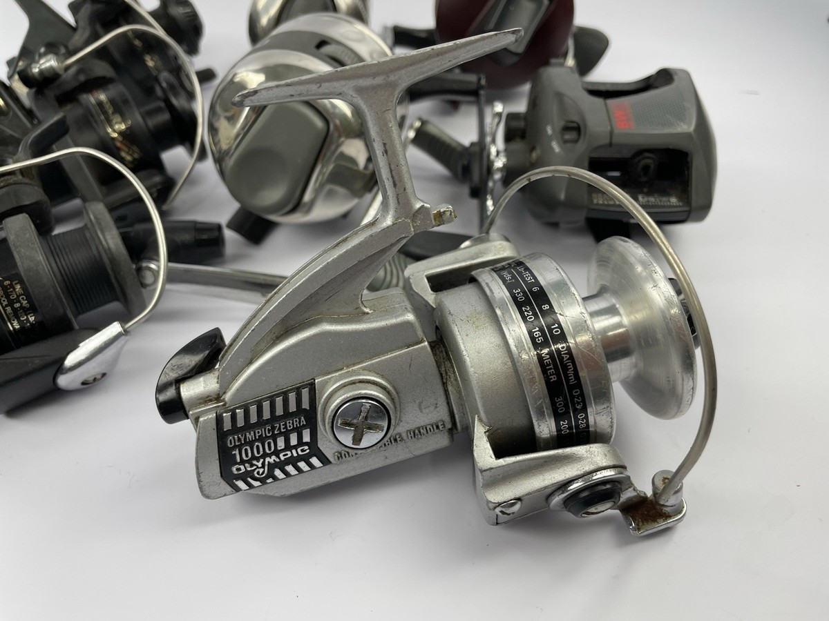 Vintage Fishing Reels Lot Of 8 Shimano, Daiwa, Zebco, Olympic