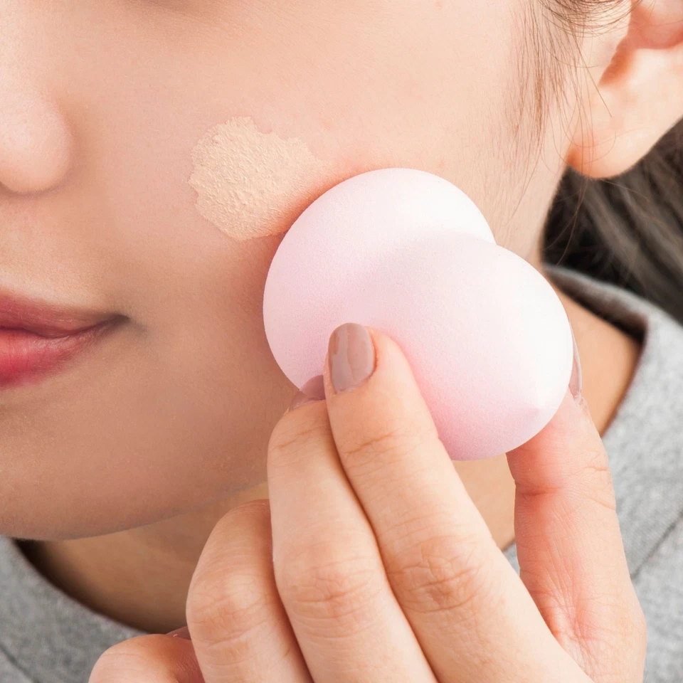 Esponja licuadora de maquillaje rosa claro caliente belleza dama diseño de botella impecable Foto 2 de 4