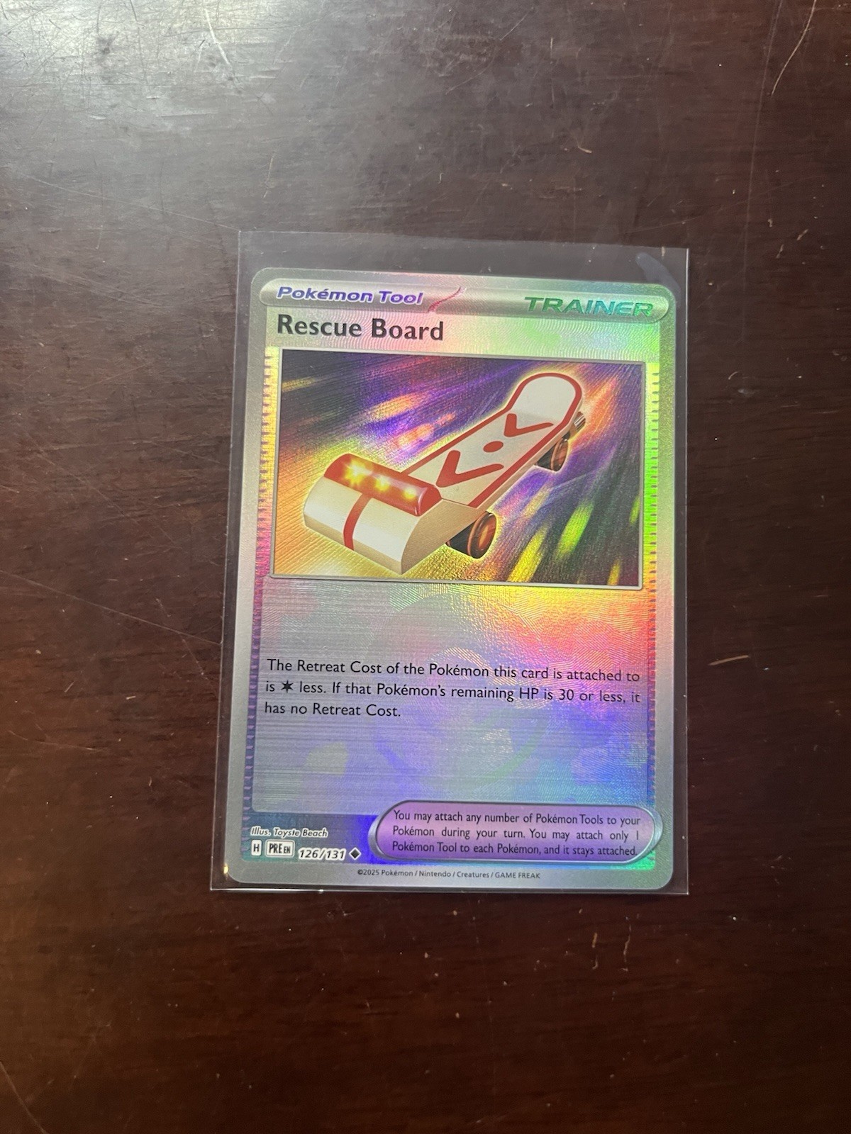 Pokemon TCG Rescue Board 126/131 Pokeball Reverse Holo Prismatic Evolutions NM
