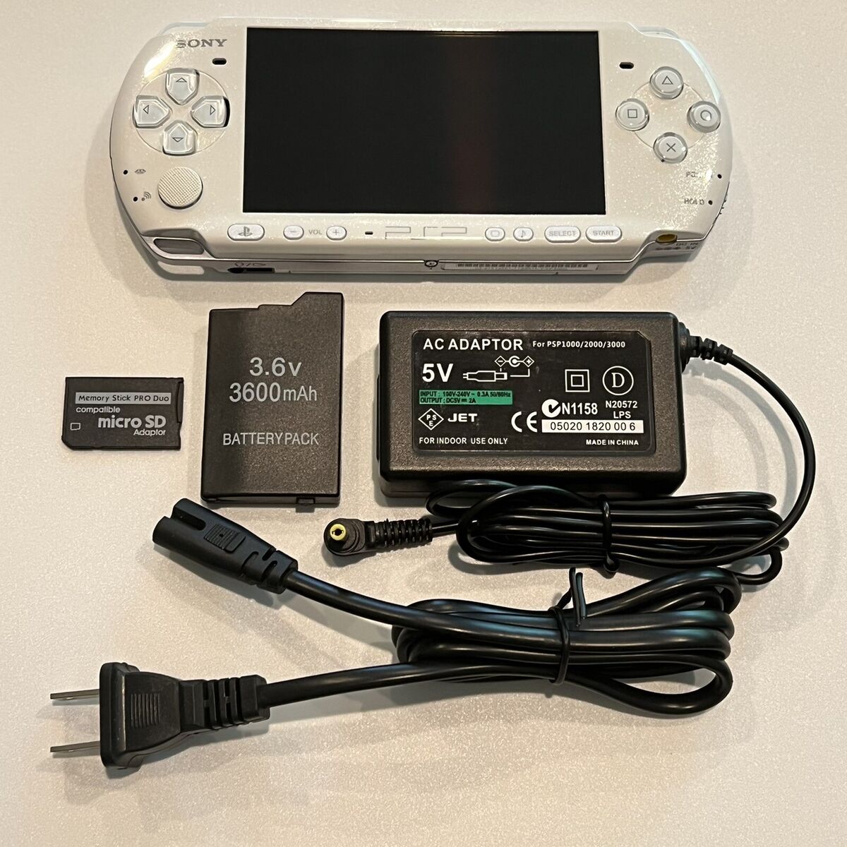 PEARL WHITE Sony PSP 3000 System w/ Charger & 16gb Memory PEARL WHITE Sony PSP 3000 System w/ Charger & 16gb Memory