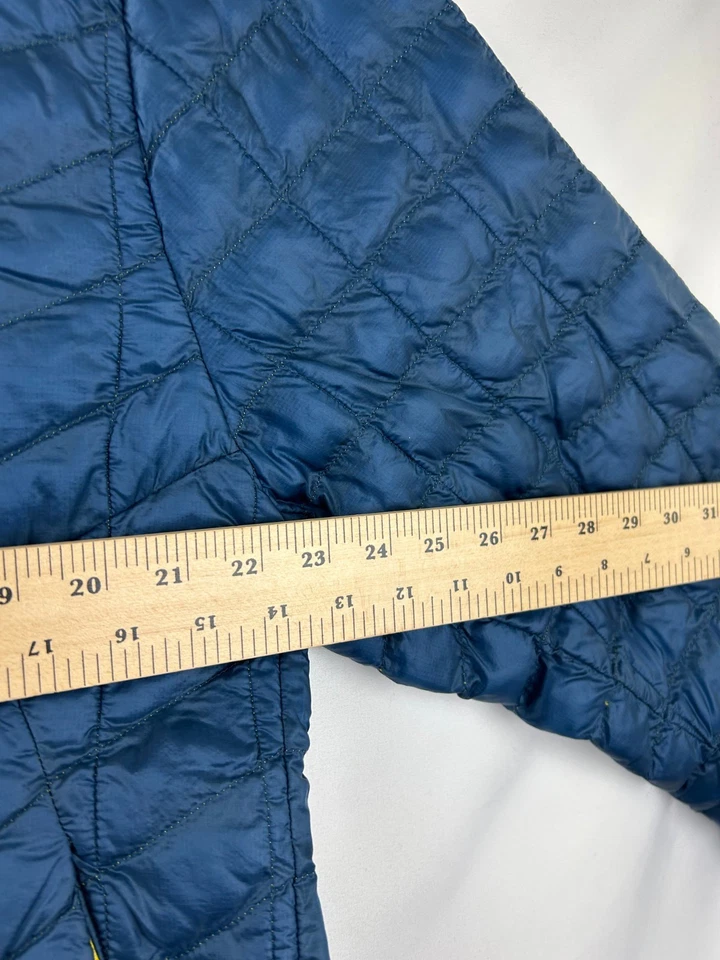 Chaqueta acolchada The North Face Thermoball para hombre talla XL azul/amarillo exterior Foto 4 de 4