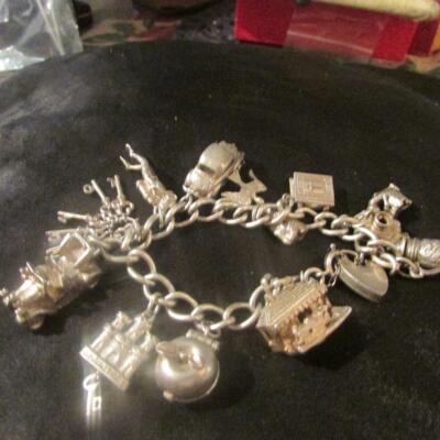 Vintage massiv Silber Bettelarmband & 13 Silber Charms, Öffner, Nuvo, Glockenspiel selten 62g