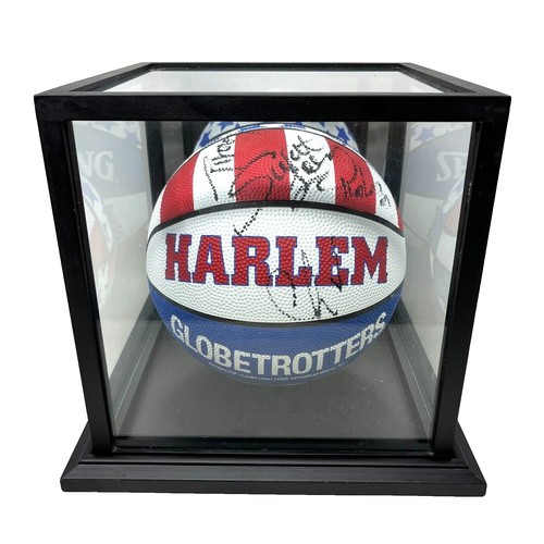 Signed Harlem Globetrotters 70th Anniversary Magazine. The whole