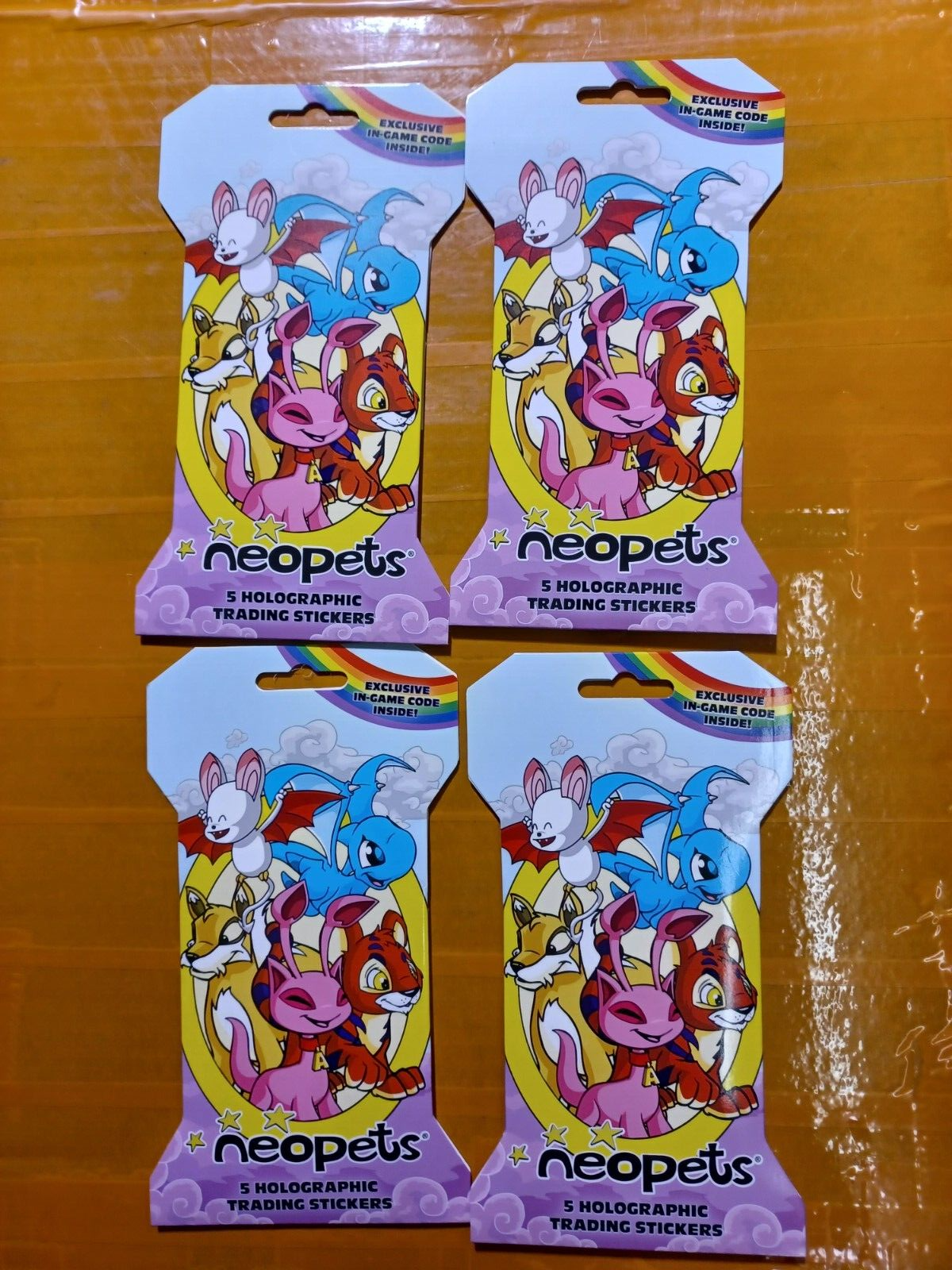 4 PACK NEOPETS HOLOGRAPHIC TRADING STICKERS BLISTER PACK w/ DLC CODE NEW