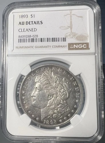 1893 Morgan  Dollar  NGC  AU Details Cleaned .