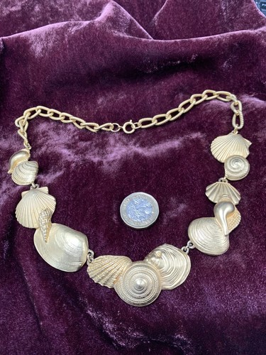 Gold Tone Seashell Charm Necklace