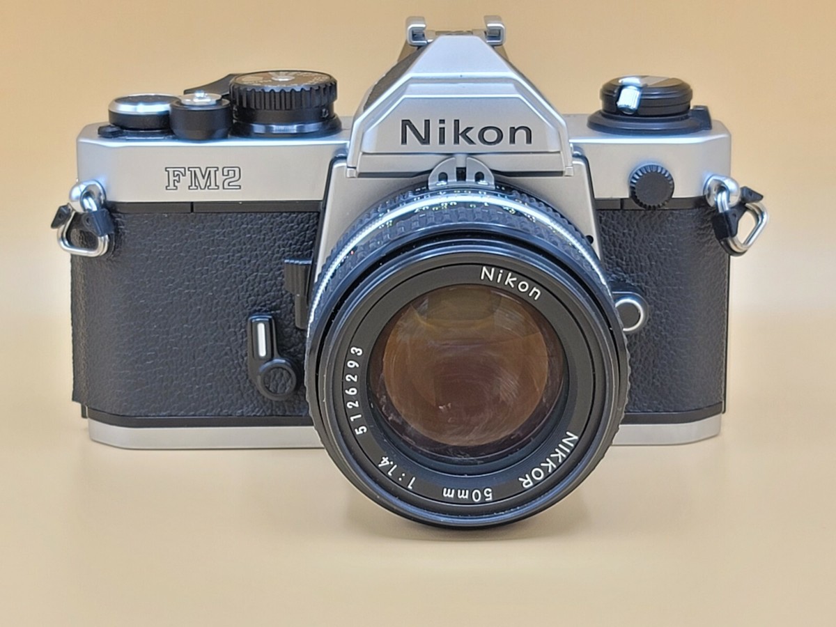 NIKON FM2 Sliver W/Nikon nikkor 50mm 1:1.4 Lens **PLEASE NIKON FM2 Sliver W/Nikon nikkor 50mm 1:1.4 Lens **PLEASE