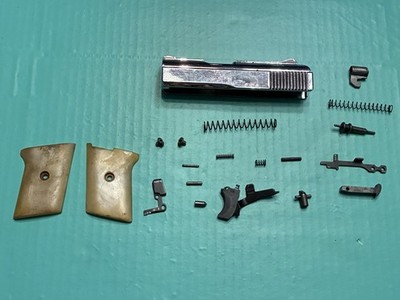 USED FACTORY RAVEN MP25 MISC PARTS SLIDE TRIGGER PINS SPRINGS GRIPS FIRING PIN