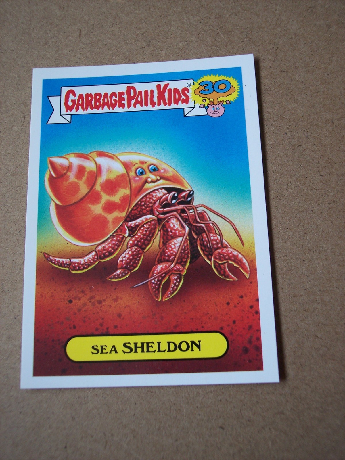 Sea SHELDON #6b 2015 Garbage Pail Kids 30th Anniversary trading card — raw and PSA graded price guide