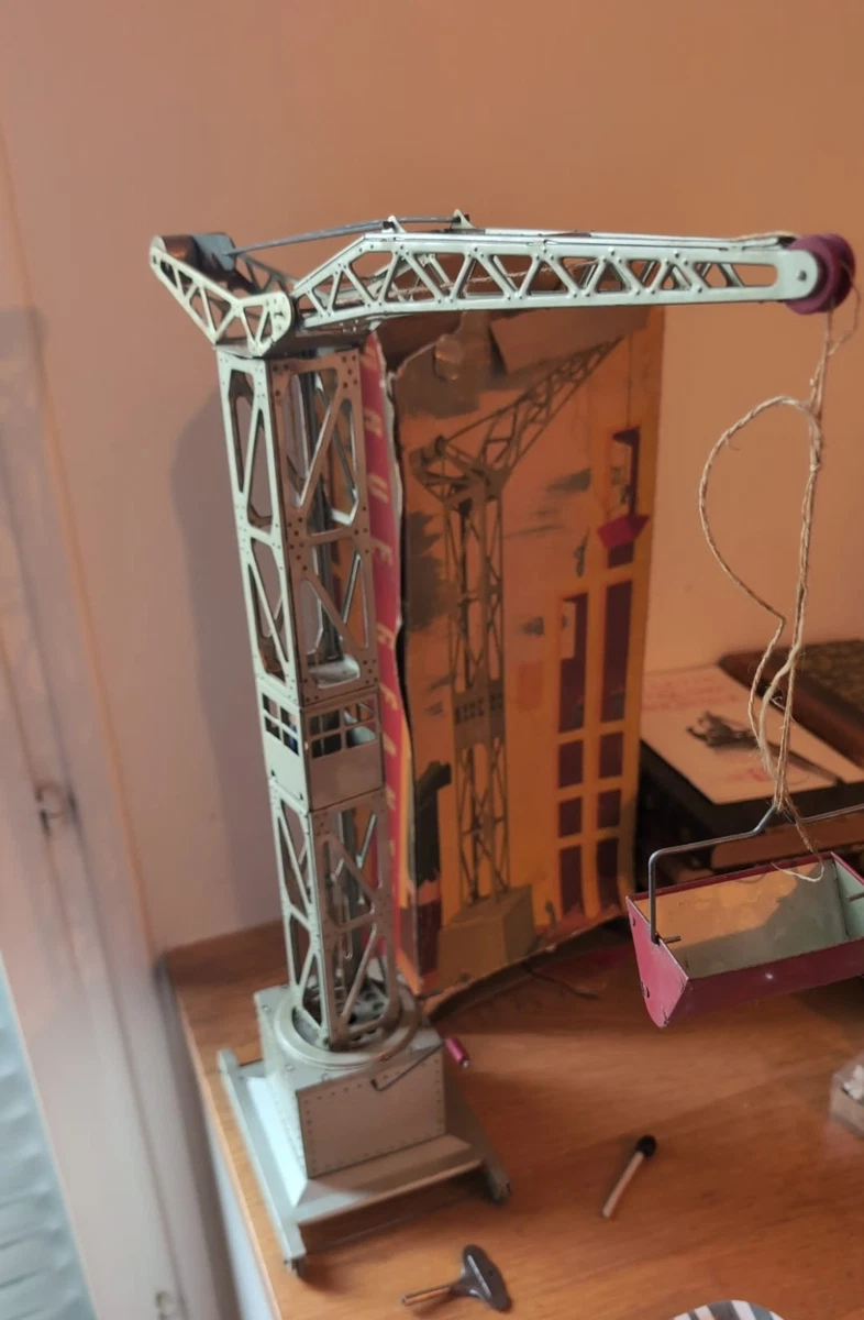 Tinplate: A boxed tinplate Port Crane, Made in France by Joustra. Clockwork mechanism. Very good original