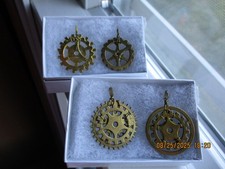 Handmade steampunk gold-toned gear pendants  Set of 4