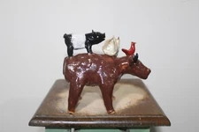 marvin lynn bailey  bull  w riders        folk art  6 '' tall  x 6'' wide