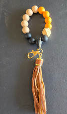 Wooden Beaded Wristlet Keychain Bangle Black Tan With Brown tassel Gold Clasp