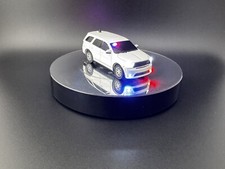 Greenlight 1/64th White Unmarked Dodge Durango With LED Lights.