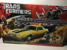 SCALEXTRIC 1/64 SLOT CAR RACE TRANSFORMER BUMBLEBEE BARRICADE RACING SYSTEM KID