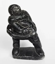 1980 Signed Inuit Stone Sculpture by SILASIE, Inuk Hunter Carrying Fish, Canada