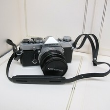 OLYMPUS OM-1 CAMERA with Olympus OM-System F.Zuiko 50mm f/1