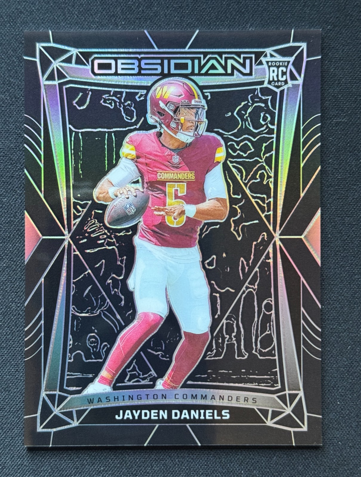 Jayden Daniels 2024 Panini Obsidian International Black Holo Rookie #194