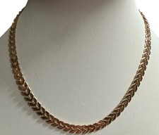 Gold-tone articulated necklace with chevron or boomerang-shaped links childs 14"