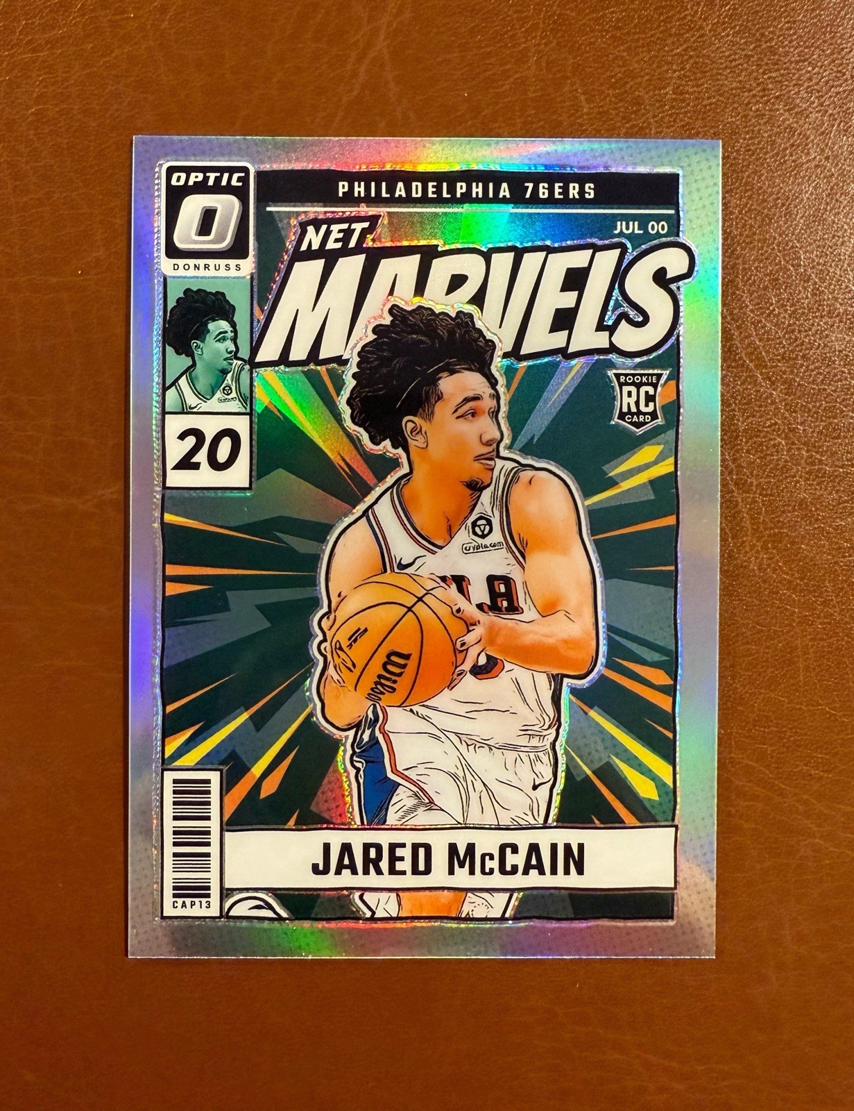 2024-25 Panini Donruss Optic #23 Jared McCain RC Net Marvels Silver Holo Prizm