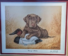 Cartel señuelo de laboratorio de chocolate con estampado Carl Melichar con señuelo de pistola enmarcado por artista