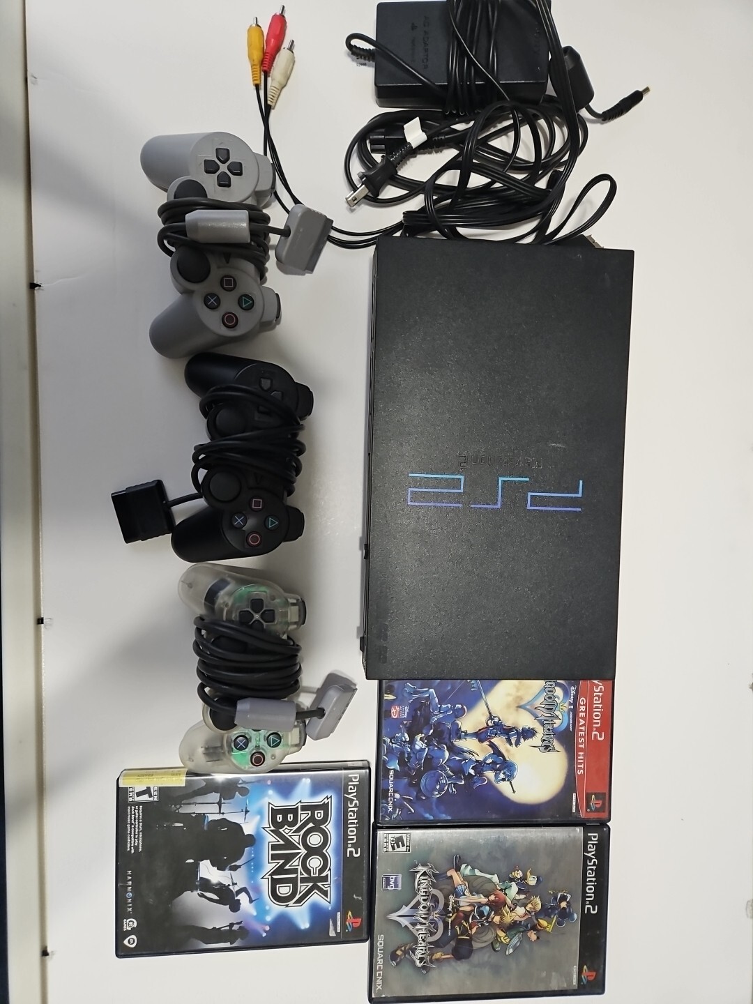 PS2 Bundle with 3 Controllers, 3 Games, and 128MB Memory Card