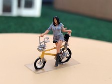 00/1:76 Hand painted figure girl on a Raleigh Chopper