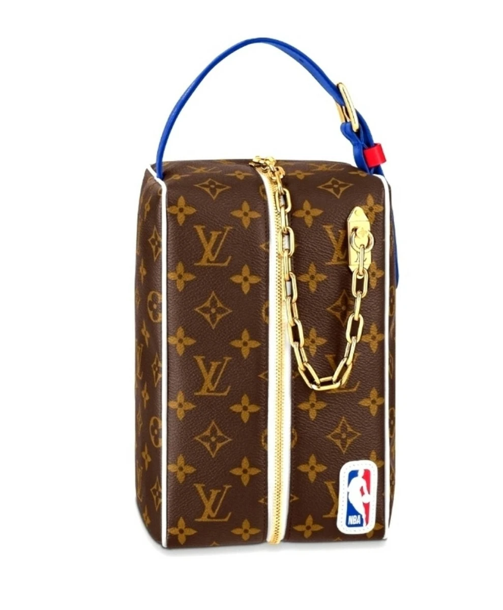 A LIMITED EDITION WHITE MONOGRAM CANVAS NBA BASKETBALL KEEPALL