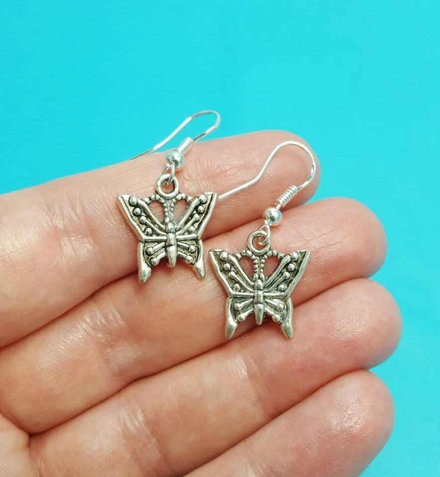 Bonitos pendientes colgantes de mariposa con ganchos de plata de ley tibetanos Foto 3 de 4