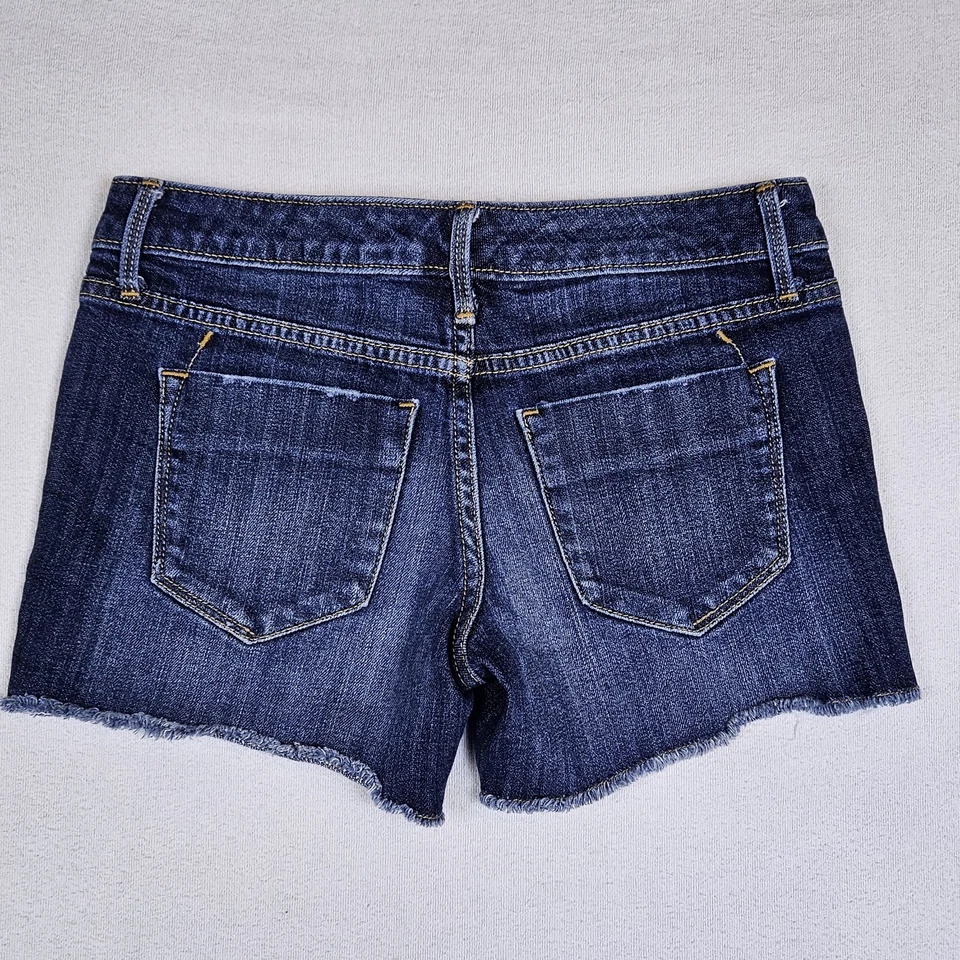 Pantalones cortos Mossimo para mujer talla 0/25 tiro medio midi dobladillo crudo denim 17730 Foto 2 de 4