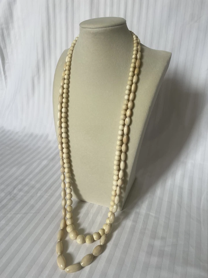 Juego de collar con cuentas de hueso Foto 2 de 4