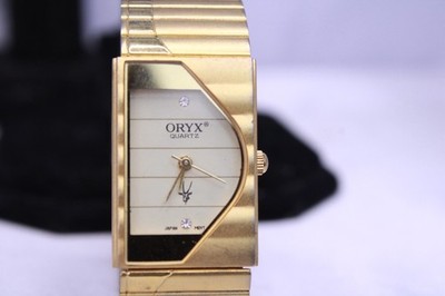 VTG THE ORYX QUARTZ HALF MOON GOLDTONE LADIES SS WATCH | eBay