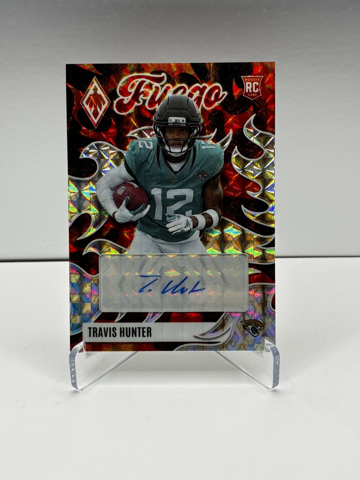 2025 Panini Phoenix Fuego Signatures Travis Hunter Rookie Auto Pyramids  61/99