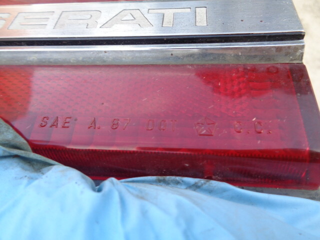 1990 CHRYSLER TC MASERATI REAR CENTER TAILLIGHT TAIL LIGHT REFLECTOR PANEL OEM