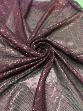 Sequin tulle fabric, sold by the yard. Color variations available.