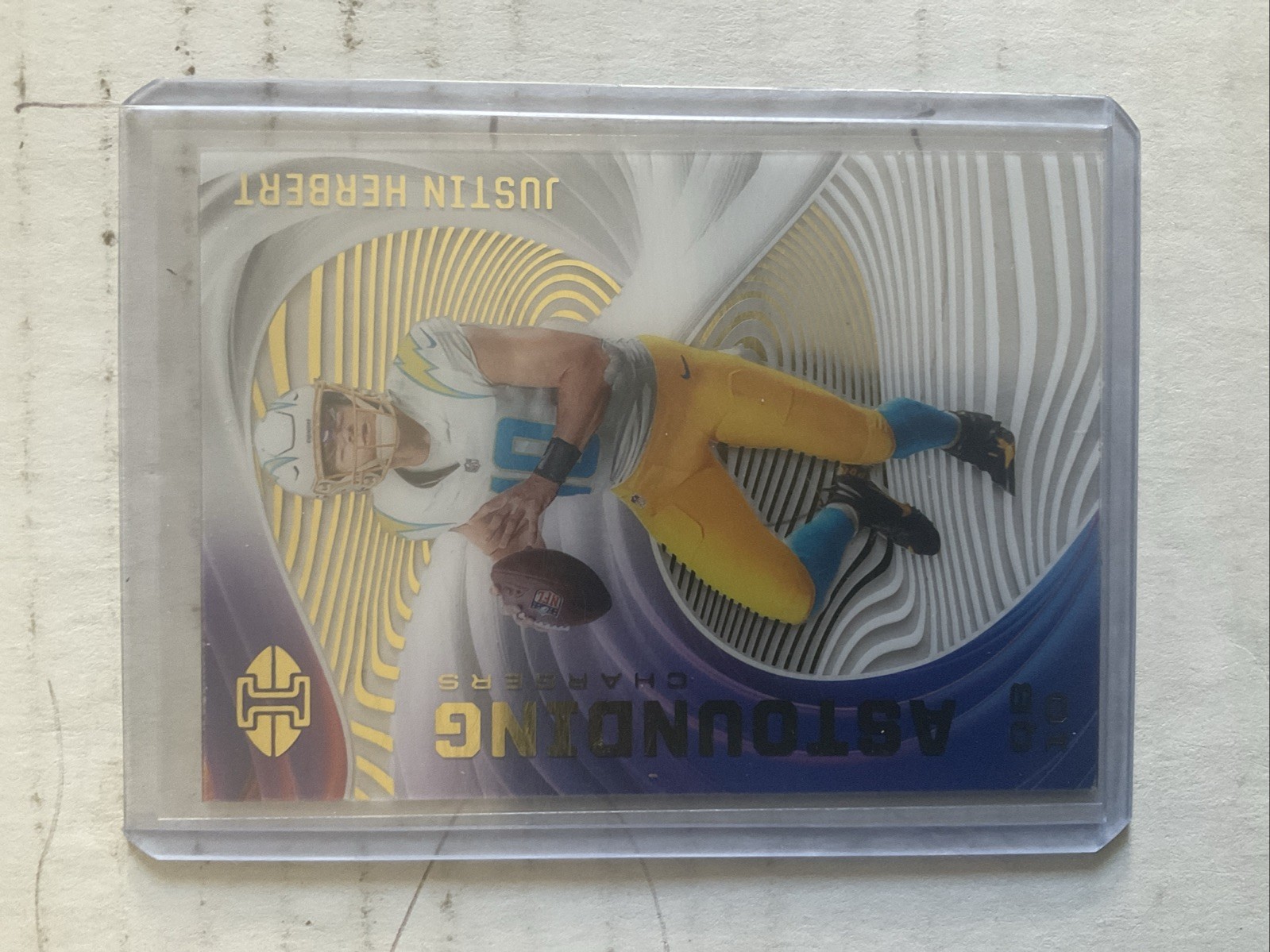 2020 Panini Illusions - Astounding Justin Herbert #A3 (RC)
