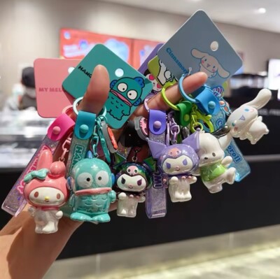 Iridescent sanrio character keychain with charm