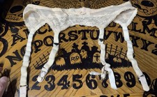 VINTAGE SAKS FIFTH AVENUE ACCENTUETTE GARTER BELT   SIZE 26. BEIGE.