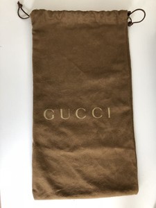 gucci wristlet bolsa