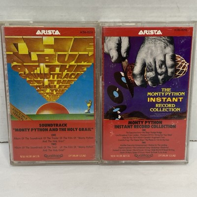 Lot Of 2 Monty Python Cassettes - The Holy Grail And Instant Record Collection