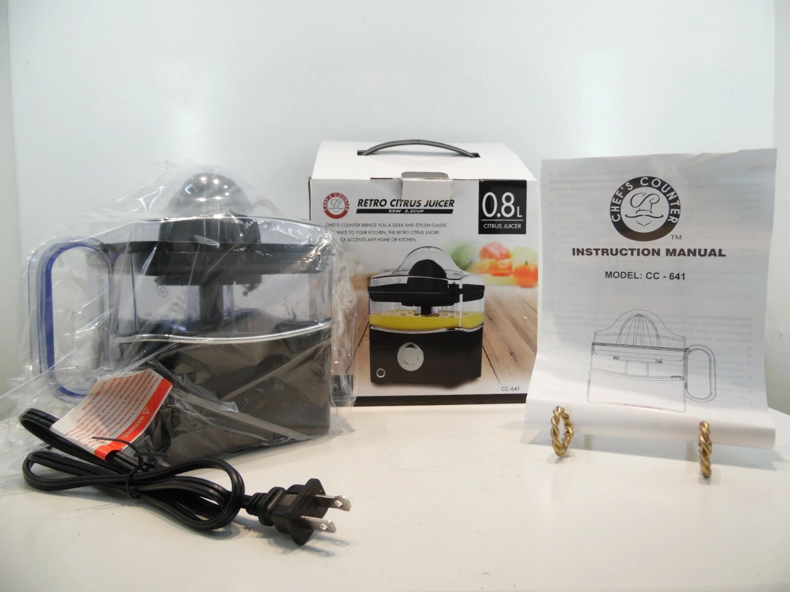 juicer machine Citrus Retro(inv485) mdl cc641 NIB 3.3 cup black and clear