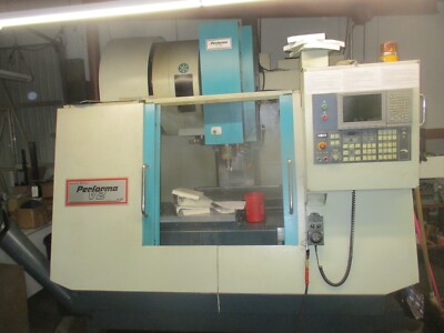 2005 AKIRA SEIKI V-2AXP CNC VERTICAL MACHINING CENTER