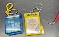 Woody Willy 1996 Basic Fun  & 2000 Hasbro Boggle Keychains 3" in size