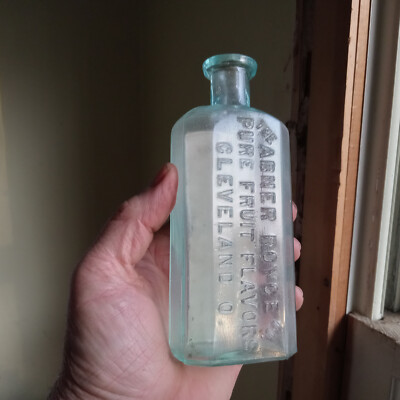 ABNER ROYCE PURE FRUIT FLAVORS AQUA EMB BOTTLE WITH VANILLA & TONKA FLAVOR LABEL