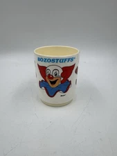 1987 DEKA Plastics BOZOSTUFFS Plastic Cup BOZO THE CLOWN Bozorina, STAINED READ