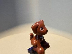 LEGO Friends reddish-brown puppy dog minifigure, also known as Scout