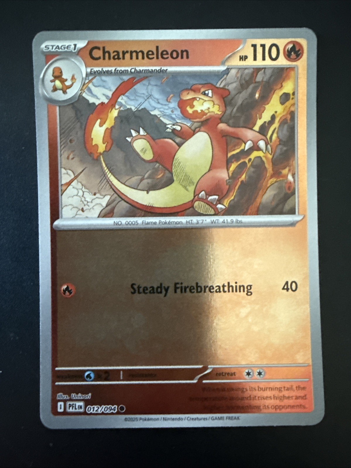 Charmeleon 012/094 Me02: Phantasmal Flames Reverse Holo