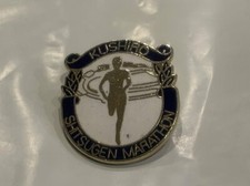 Prendedor sombrero solapa maratón Kushiro Shitsugen CC
