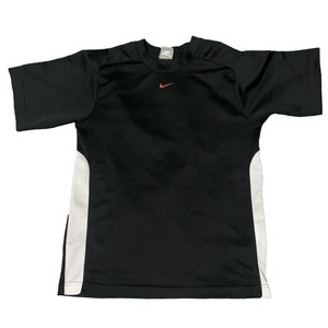 black nike shirt with red swoosh