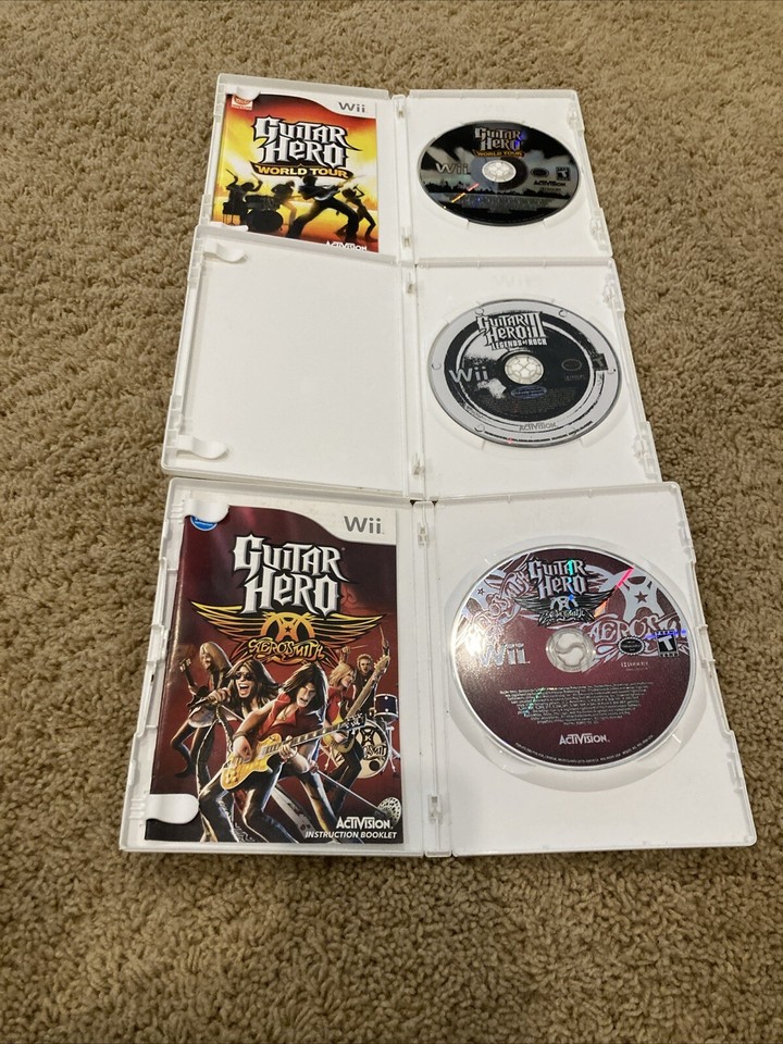 Wii Console Bundle Guitar Hero Games + Controllers + Guitar + Cords